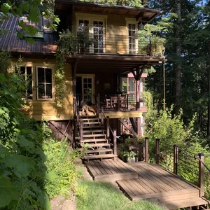Multi-level home with decking and stairs